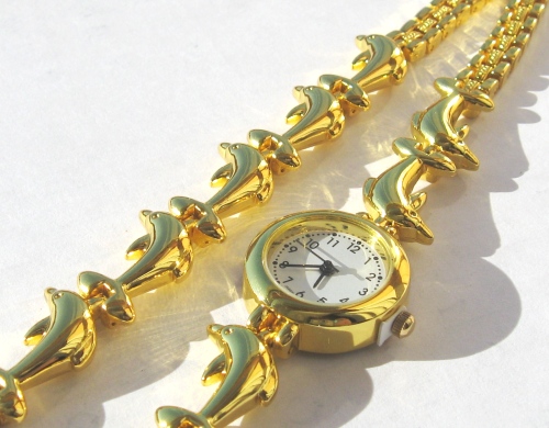 Gold plated Dolphin watch and bracelet from crimeajewel